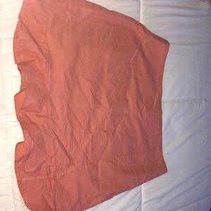 Strawberry colored, frilly, skirt.